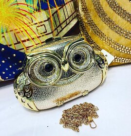 Owl Clutch in golden colour