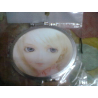                       round shape travel mirror or purse mirror with twinkling eyes                                              