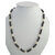 Dyed Black and white Fresh Water Pearl 20 inches long necklace adorn with golden tone plain metal beads secure with metal clasp