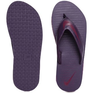 purple nike flip flops