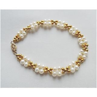                       Fresh Water Pearl Adorn with Golden tone metal beads bracelet in 8 Inches                                              