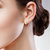 Sukai Jewels Bulky Gold Plated Alloy & Brass Cubic Zirconia Bali Earring for Women & Girls [SBL105G]